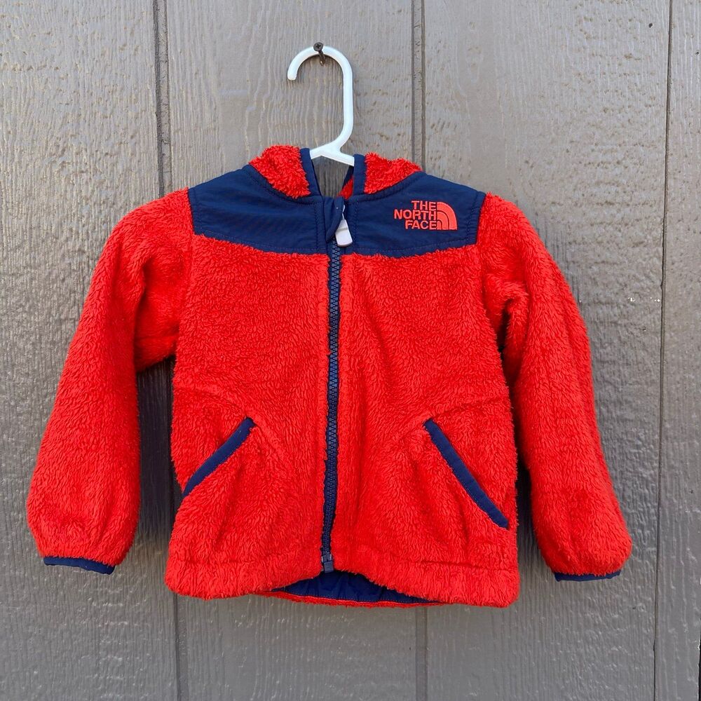 The north face fuzzy furry infant zip up jacket size 12-18 months red and blue